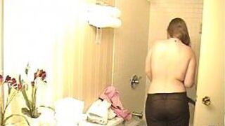 Geek teen on hidden camera showering plump blonde pussy - porn video